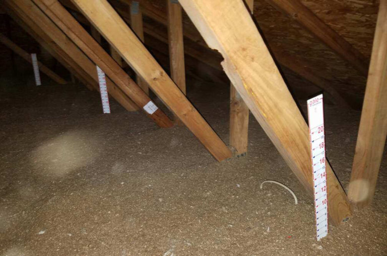 Attic blown insulation beams not visible